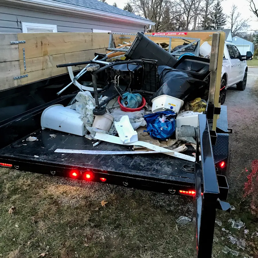Roll-off dumpster delivered to a residential driveway in Warrensburg